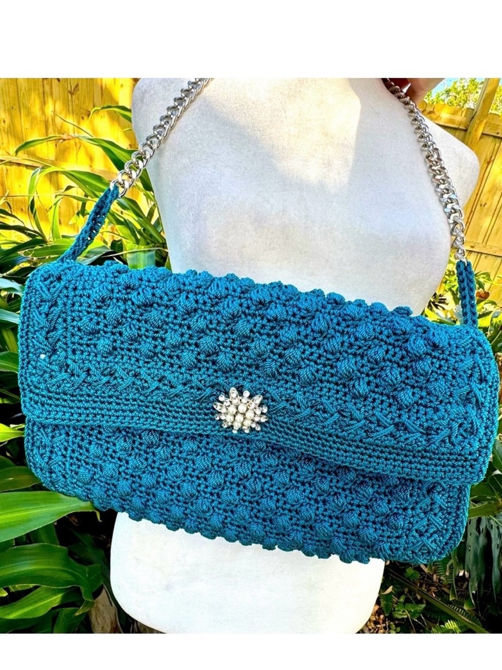 Vintage Handmade Bubble Crochet bag in turquoise with chain strap and brooch.